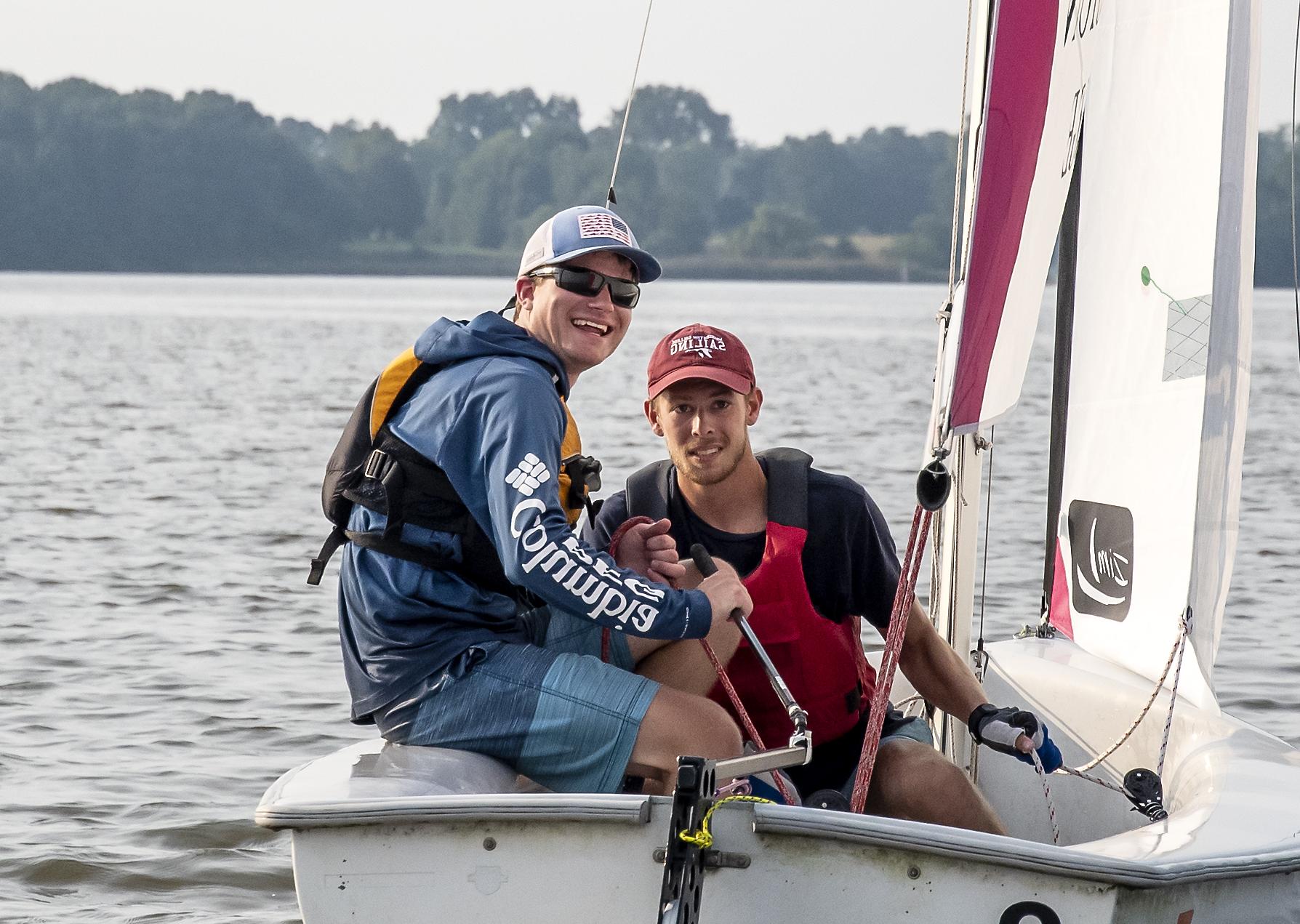 Two men sailing