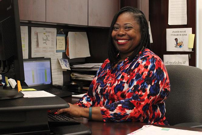 Lisa Moody at her desk